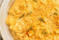 THOUGHT
The user wants me to translate and “özgünleştir” (make more original/creative) a Turkish title into English.
The provided title is “Deviled Egg Salad”.
I need to:
1.  Take the given title: “Deviled Egg Salad”
2.  Translate it (it’s already English, but the prompt implies this step).
3.  Make it more original/creative, but still represent the concept.
4.  Remove any special characters from the *original* given title (there are none).
5.  Not add any special characters like asterisks.
6.  Not include introductory phrases like “İşte özgün başlık:”.
7.  Provide only one single, original title.Let’s brainstorm some variations for “Deviled Egg Salad”:
*   Spicy Egg Salad
*   Zesty Egg Salad
*   Tangy Egg Salad
*   Classic Deviled Egg Salad (not very original)
*   Signature Deviled Egg Salad (a bit generic)
*   Creamy Deviled Egg Salad
*   Perfectly Deviled Egg Salad
*   Elevated Deviled Egg Salad
*   A Devilishly Good Egg Salad
*   Devilish Delight Egg Salad
*   Fiery Egg Salad Spread
*   Spiced Egg Salad Sensation
*   Zingy Egg Salad Blend
*   The Devil’s Own Egg Salad (a bit too playful/long)
*   Gourmet Deviled Egg SaladThe goal is to make it “özgünleştir” – more unique, appealing, or descriptive, without being overly long or complex.
“Deviled Egg Salad” already has a specific meaning (spicy, tangy, often made with yolks, mayonnaise, mustard, paprika).Let’s try to capture the essence of “deviled” (spicy/flavorful) or the creamy texture.“Spicy Zest Egg Salad” – Combines two elements.
“Zesty Deviled Egg Salad” – Keeps the “deviled” aspect but adds zest.
“Creamy Spiced Egg Salad” – Focuses on texture and flavor.I need to choose just one. “Deviled” itself implies a certain zest and spice. How can I make it *more* original?“Deviled Egg Salad” is a well-established name. To “özgünleştir” it means to give it a fresh spin.Consider the core attributes:
1.  **Eggs:** Obviously.
2.  **Deviled:** Spicy, tangy, rich, often paprika-dusted.
3.  **Salad:** A mixture, often spreadable.How about something that evokes the taste experience?“Piquant Egg Salad” – Piquant means pleasantly sharp and appetizing flavor.
“Tangy & Creamy Egg Salad” – More descriptive.
“Devilish Delicacy Egg Salad” – Playful.
“Spiced & Creamy Egg Salad” – Focuses on key attributes.Let’s try to make it sound appealing and slightly more gourmet/inviting.“Zesty Deviled Egg Salad” is good but perhaps not original enough.
“Spiced Deviled Egg Salad” – Emphasizes the spice.What if I change the word “Deviled” itself, while still conveying the meaning?
“Zesty Spiced Egg Salad”
“Tangy Egg Salad Perfection”
“Spicy Creamy Egg Salad”Let’s go for something that highlights the flavor profile in an inviting way.
“Zesty Spiced Egg Salad” sounds good. It captures the tang and the heat/flavor.
“Piquant Egg Salad” is concise and descriptive.The user asked to “özgünleştir”. “Piquant Egg Salad” is certainly a less common term than “Deviled,” making it more original, while still accurately describing the dish’s core flavor profile.Let’s stick with “Piquant Egg Salad”.
It’s one title.
No special characters.
No introductory text.