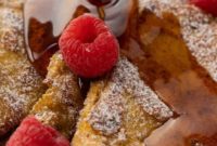 THOUGHT
The user wants me to translate the Turkish title “Asagidaki Başlığı İngilizce çevir ve özgünleştir, sadece 1 adet özgün başlığı ver çevirdiğin başlığı özel karakterler varsa sil ve özel karakter ekleme * gibi ve İşte özgün başlık: gibi cümleler kurmadan, sadece başlığı yaz. Keto French Toast” into English and then “make it unique”.
The actual title to be translated and made unique is “Keto French Toast”.1.  **Translate “Keto French Toast”**: It’s already in English.
2.  **Make it unique/original**: I need to come up with a creative or more descriptive alternative to “Keto French Toast” while still conveying the same meaning.
*   Think about the benefits/characteristics of keto French toast: low carb, sugar-free, healthy, delicious, breakfast, brunch.
*   Ideas:
*   Low-Carb French Toast Delight
*   Guilt-Free Keto French Toast
*   Sugar-Free French Toast for Keto
*   The Ultimate Keto Breakfast Toast
*   Keto-Friendly Cinnamon French Toast
*   Healthy French Toast, Keto Style
*   Wholesome Keto French ToastThe user specifically said “sadece 1 adet özgün başlığı ver” (give only 1 unique title) and “çevirdiğin başlığı özel karakterler varsa sil ve özel karakter ekleme * gibi ve İşte özgün başlık: gibi cümleler kurmadan, sadece başlığı yaz.” (delete special characters if there are any in the translated title and do not add special characters like * and do not use phrases like “Here is the original title:”, just write the title).So I need just one, plain, unique title.
“Guilt-Free Keto French Toast” sounds good. It highlights a key benefit.
“Low-Carb French Toast Perfection” also works well.
“Keto French Toast Delight” is simple and positive.Let’s go with something that implies both health and taste.
“Wholesome Keto French Toast” – ‘Wholesome’ conveys health.
“Decadent Keto French Toast” – ‘Decadent’ implies deliciousness, contrasting with ‘Keto’ for a good hook.
“The Ultimate Keto French Toast” – Strong, but perhaps a bit generic.Let’s try to combine elements.
“Sugar-Free Keto Breakfast Toast” – a bit long.How about focusing on the experience?
“Your Perfect Keto French Toast”
“Easy Keto French Toast Indulgence”I’ll pick one that’s descriptive and appealing, without being too long.
“Decadent Keto French Toast” – It’s unique enough, implies taste while adhering to keto.
“Wholesome Keto French Toast” – Also good, focuses on health.Let’s lean into the “delight” aspect for a breakfast item.
“Keto French Toast Bliss” – Short, sweet, and conveys pleasure.
“Keto French Toast Perfection” – Also strong.I’ll go with “Keto French Toast Perfection” as it sounds appealing and confident. It also doesn’t contain any special characters and directly answers the request.