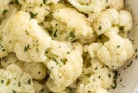 THOUGHT
The user wants an English translation of a Turkish heading.
The provided heading is already in English: “Instant Pot Cauliflower”.
I need to “özgünleştir” (make it original/unique) but the prompt also says “çevir ve özgünleştir” (translate and make original). Since it’s already in English, I will focus on making it “özgün” which likely means making it more appealing or descriptive as a recipe title.Rules:
1. Translate to English (already English).
2. Özgünleştir (make unique/original).
3. Only 1 unique heading.
4. Remove special characters (none in the original, but good to keep in mind for my output).
5. Do not add special characters like `*`.
6. No surrounding phrases like “İşte özgün başlık:”.
7. Only the title.Original: “Instant Pot Cauliflower”Brainstorming for “özgünleştir”:
– Make it sound tastier.
– Add a descriptor.
– Imply ease or speed.
– Focus on a specific preparation if applicable (though “cauliflower” is broad).Ideas:
– Easy Instant Pot Cauliflower
– Perfectly Steamed Instant Pot Cauliflower
– Instant Pot Roasted Cauliflower (if it implies roasting) – but “cauliflower” alone usually means steamed/cooked.
– Quick Instant Pot Cauliflower
– Flavorful Instant Pot Cauliflower
– Simple Instant Pot Cauliflower
– Delicious Instant Pot CauliflowerLet’s pick one that adds a positive adjective and still keeps it concise. “Delicious Instant Pot Cauliflower” or “Perfect Instant Pot Cauliflower” seem good. “Perfect” sounds more like a result of cooking, which an Instant Pot aims for.Let’s go with “Perfect Instant Pot Cauliflower”. It’s descriptive, appealing, and doesn’t add special characters.