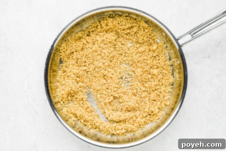 Garlicky Italian Green Beans 6 Italian green beans step 1: Toasting breadcrumbs and parmesan in a skillet until golden and fragrant.