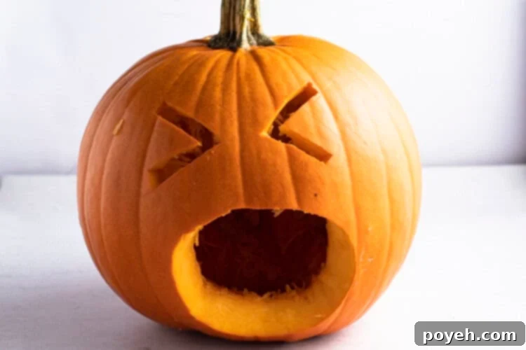 Face carved into front of pumpkin for puking pumpkin