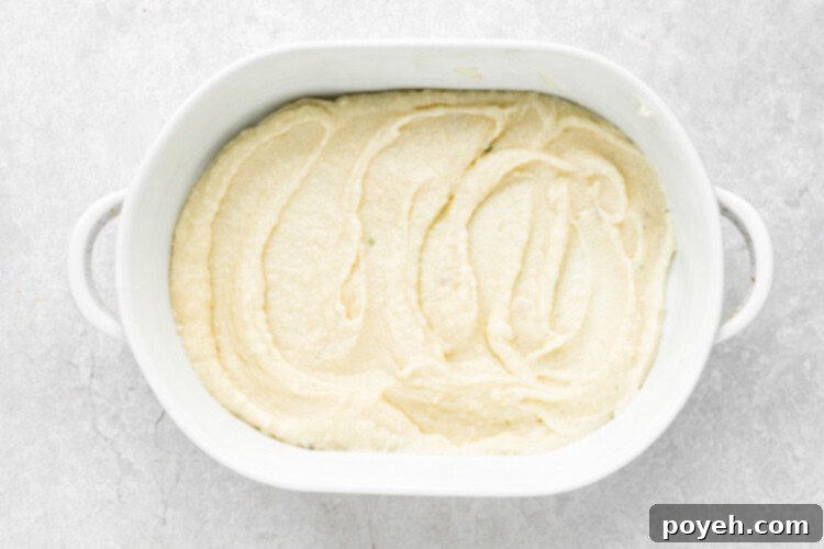 Mashed potatoes baking in a shallow dish