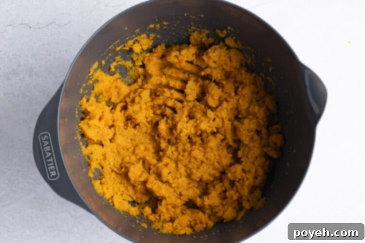Whipped sweet potatoes in large bowl