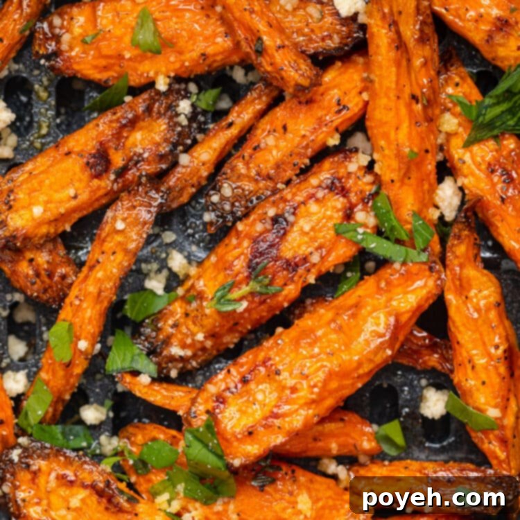 Air fryer carrots in an air fryer basket.