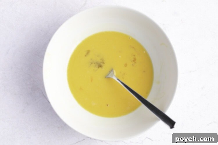 Egg wash in shallow bowl