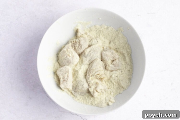 Chicken pieces in coconut flour mixture
