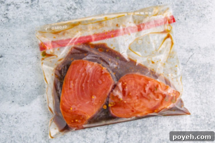 Ahi tuna steaks in a ziploc bag with marinade.