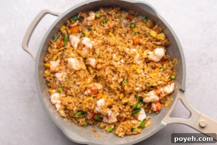 Lobster fried rice in a large skillet.