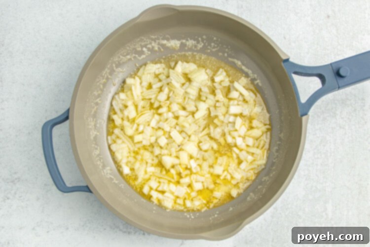 Melted butter and onions in a large skillet.