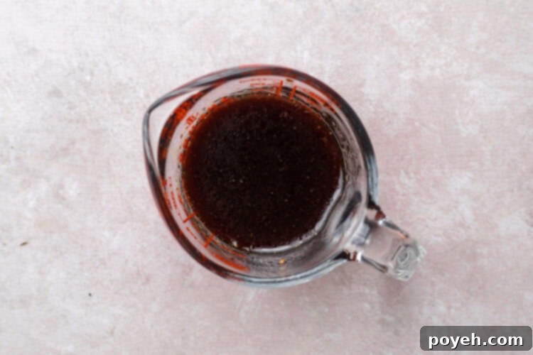 Marinade mixture of garlic, soy sauce, honey, red wine vinegar, and olive oil.