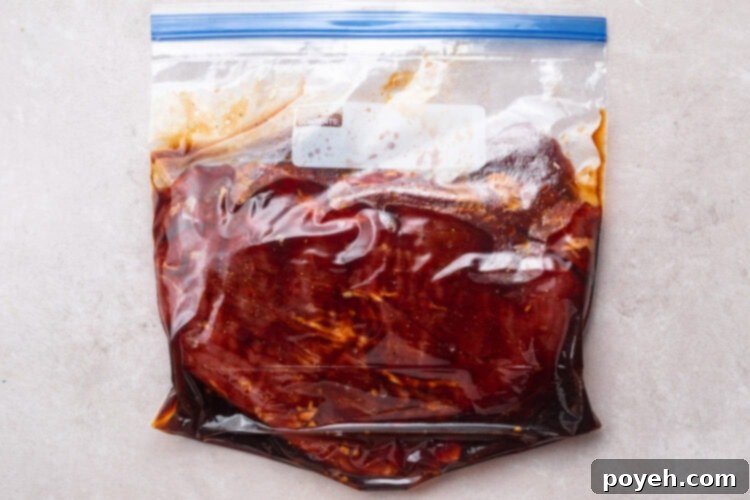 Flank steak and marinade in large ziploc bag.