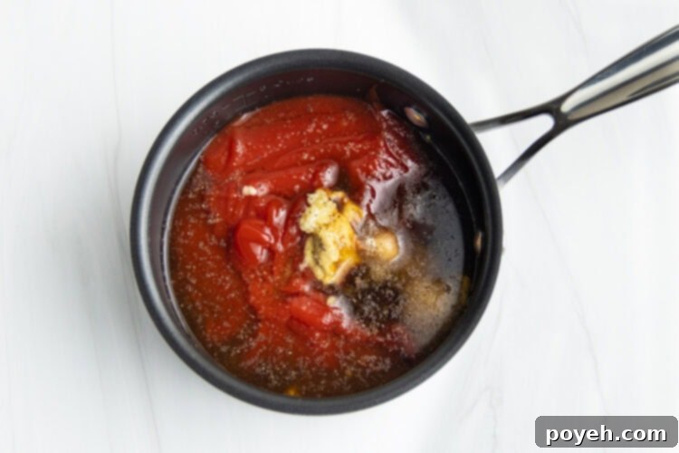 Homemade BBQ sauce ingredients in a small saucepan.