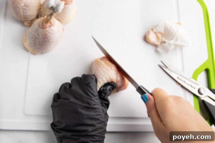 How to lollipop chicken legs, step 3.