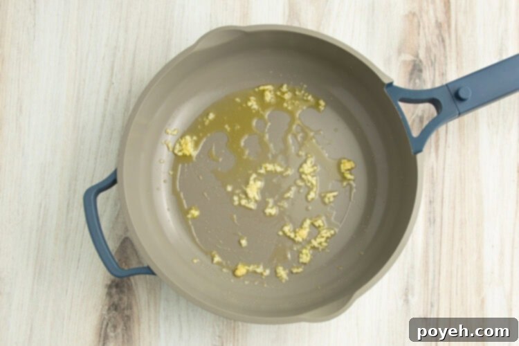 Lemony Garlic Shrimp with Rice 7 Oil and minced garlic in a large skillet.