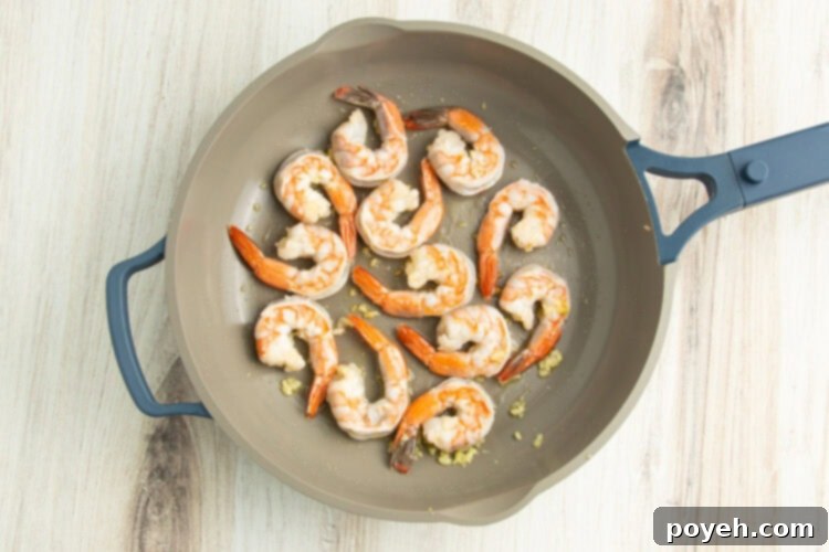 Lemony Garlic Shrimp with Rice 8 Shrimp in skillet.