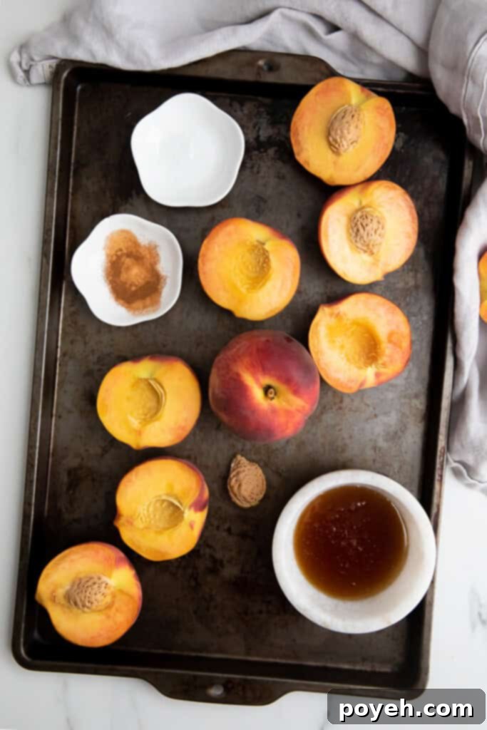 Peaches with pits removed, halved and ready for grilling