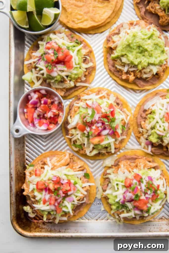 Top shot of our tortillas loaded with toppings, showing a colorful and appetizing spread