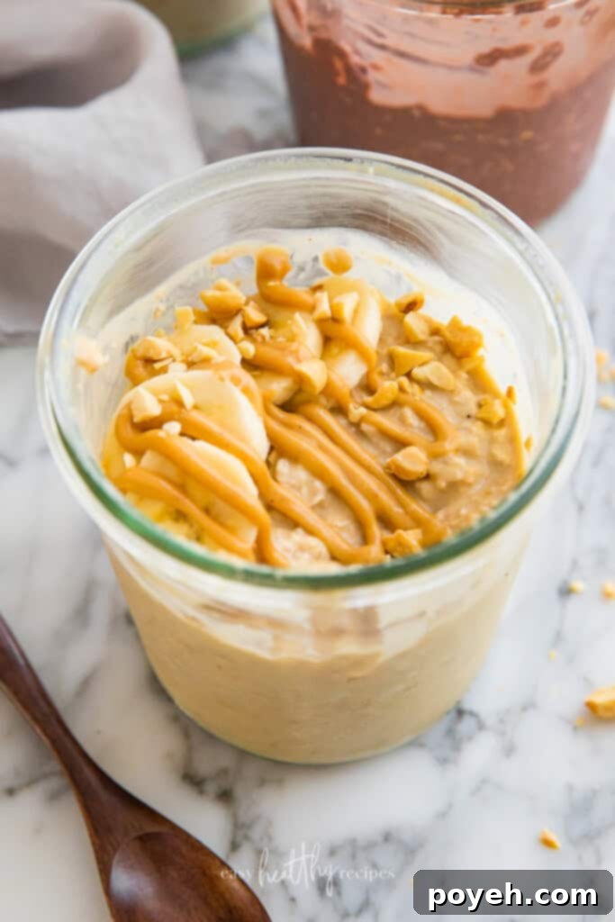 A jar of creamy peanut butter vegan overnight oats, generously topped with fresh banana slices and a sprinkle of chia seeds, offering a wholesome and satisfying breakfast.