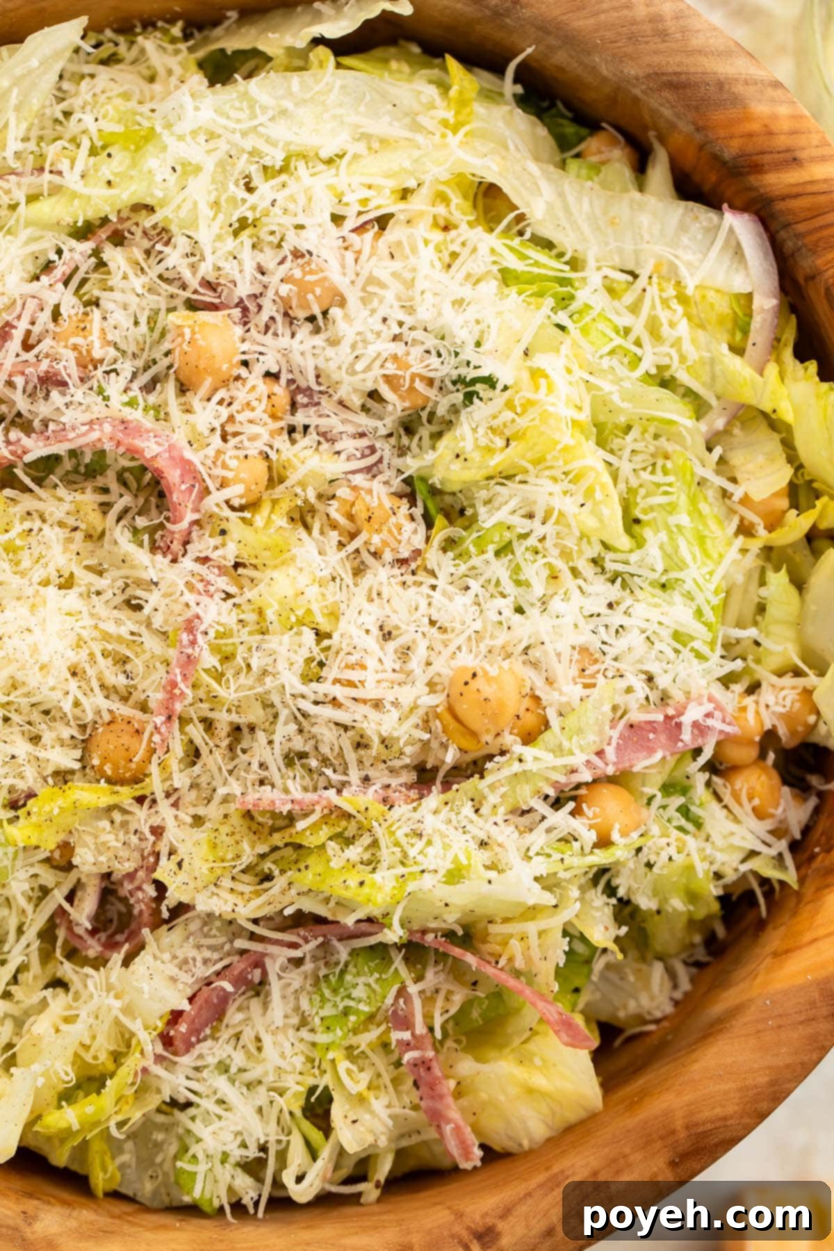 Close-up of Kardashian salad (La Scala chopped salad) in a wooden bowl.