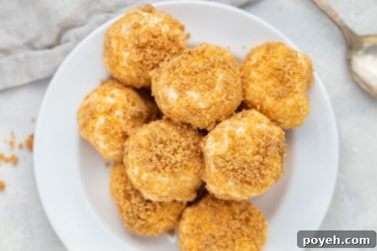 A mountain of cream cheese fat bombs on a white plate
