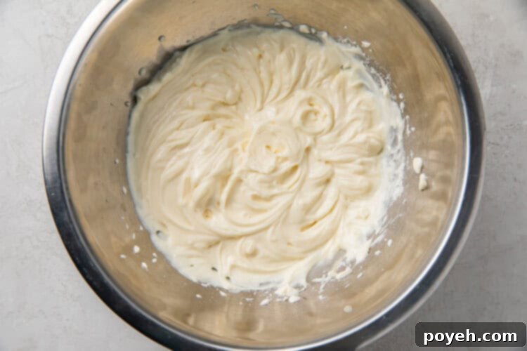 Cream cheese fat bomb filling in a silver mixing bowl