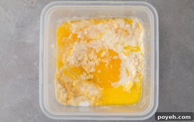 Ingredients for keto bread in a bowl being whisked together