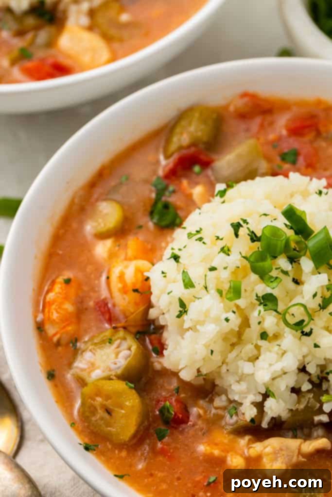 Close up photo of a white bowl of keto gumbo