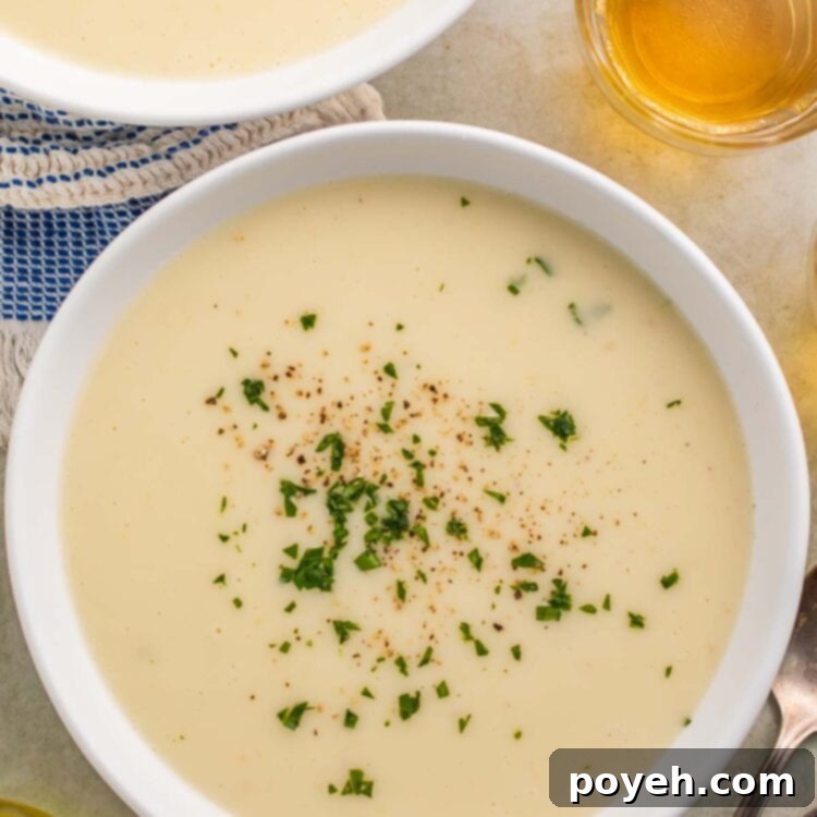 Close-up of a bowl of Irish potato soup on a table.