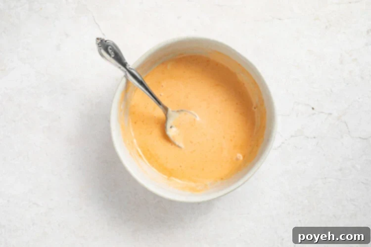 Mixing ingredients for vegan sriracha mayo