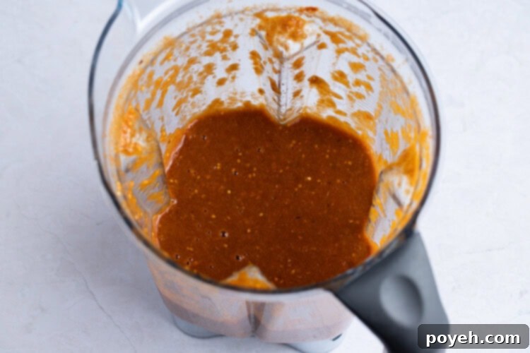 Tomatillo red chili salsa in a blender