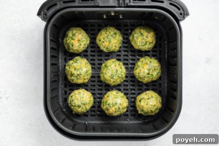 Air Fryer Falafel balls being formed by hand